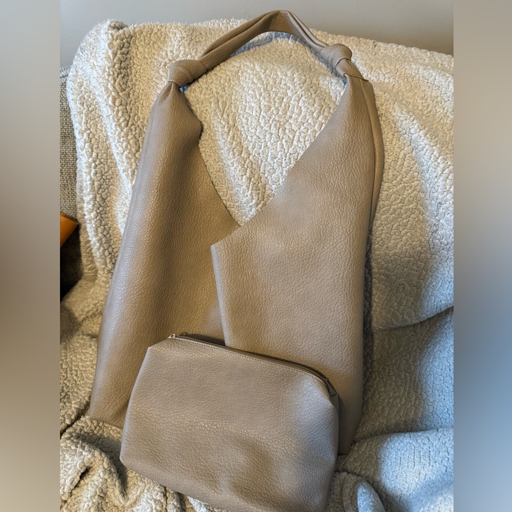 Gently used Anthropology The Love Knot bag and pouch in Taupe bought in 2024